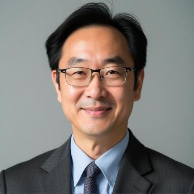 Headshot of Akihiko Sato, historian.